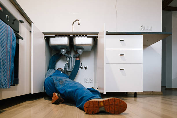 Professional Drain Cleaning technician working in Molino, FL